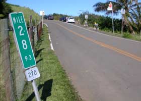 Beginning of the Akoni Pule Highway (state route 270) at the Polulu Valley Lookout, heading back toward Kawaihae; terminal milepost 28.93 at the left