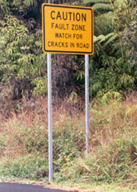 CAUTION - Fault Zone - Watch for Cracks in Road
