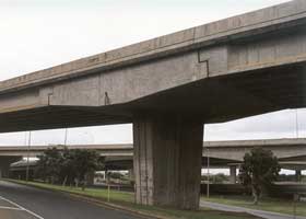 Hammerhead pier on Dillingham Blvd. overpass crossing over Nimitz Hwy, H-1 viaduct in background.