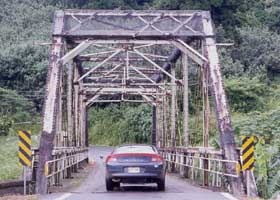 View from the east end of the pre-restoration Hanalei Bridge