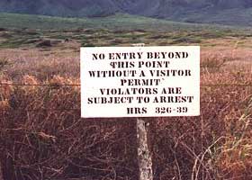 Sign at airport exit:  No entry beyond | this point | without a visitor | permit | Violators are | subject to arrest | HRS 326-39