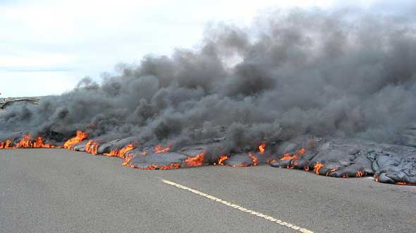 Asphalt meets fiery and smoky end, as lava starts to cover road