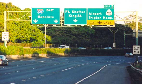 Overhead signs on eastbound H-201 with new Interstate shield, at exit 3 westbound H-3