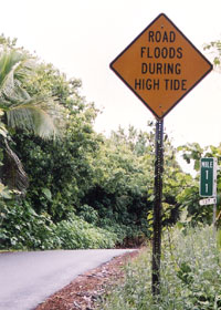 Sign warning of flooding at high tide