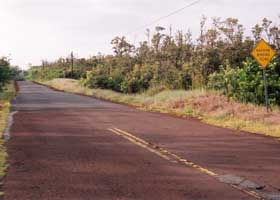 Red Road facing south, as old red pavement changes to new black pavement