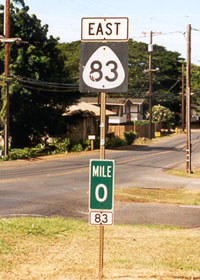 Standard-style Route 83 shield, with milemarker 0 and route number plate mounted underneath