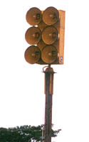 Civil defense sirens, two columns of three yellow horns all facing forward