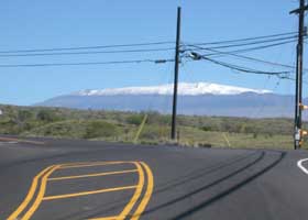 South end of state route 270, with snow-covered Mauna Kea summit in background