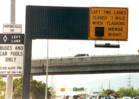 Overhead warning when two left lanes westbound are closed to make room for the zipper lane